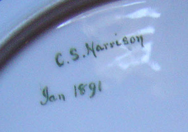 Bottom of the ribbon plate, signed 
