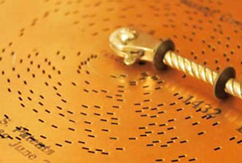 Close up of Benjamin Harrison era music box, found within the Home.