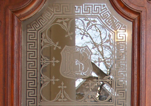 Victorian front door and etched glass of the Benjamin Harrison Presidential Site 1875 Italianate style home. Etched glass was a 